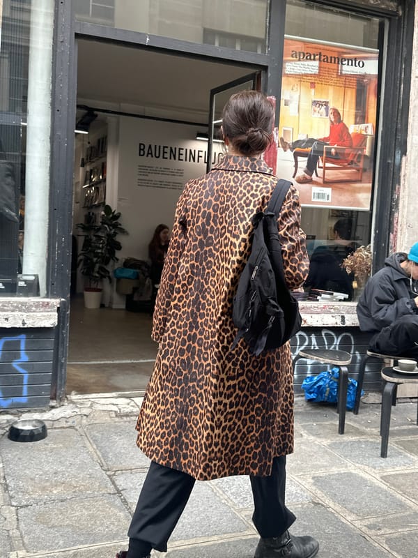 Parisians enjoy casual afternoon coffee and street life
