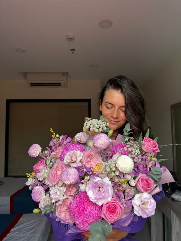 Pink and purple flower bouquet, hotel room, Nha Trang
