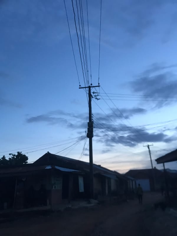 Twilight descends over Rafin Par Nigeria streets and buildings