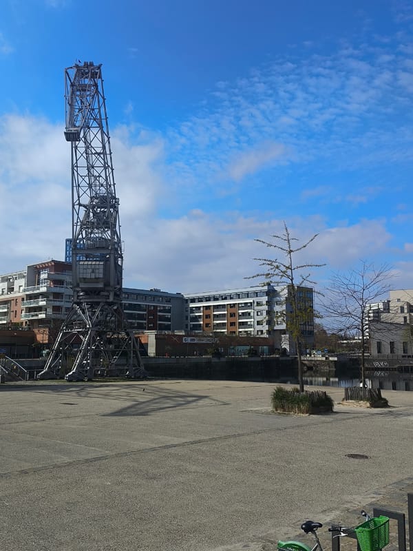 Historic Yellow Crane and waterfront observed in Strasbourg
