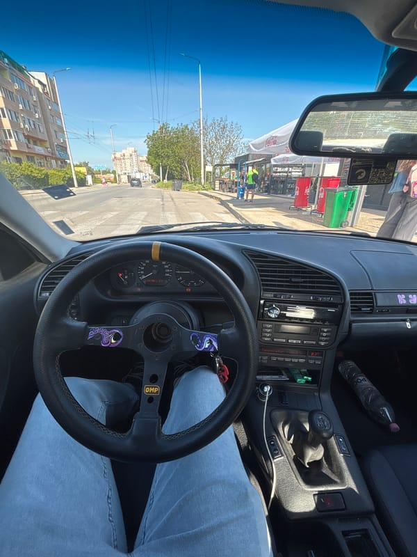 Vehicle interior documented in Pleven, Bulgaria featuring OMP steering wheel