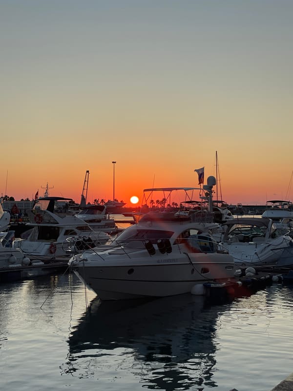 Sochi marina and waterfront at sunset, golden hour stroll