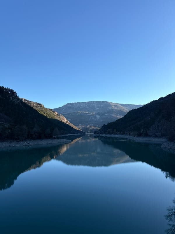 Morning lake reflections captured near Castellane, French Alps