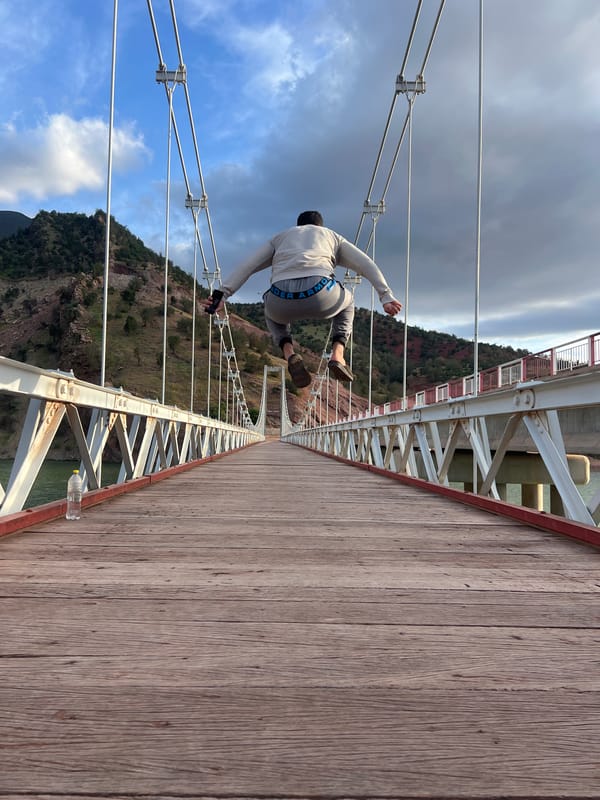 Man performs bridge stunts near Ouaouizert, Morocco