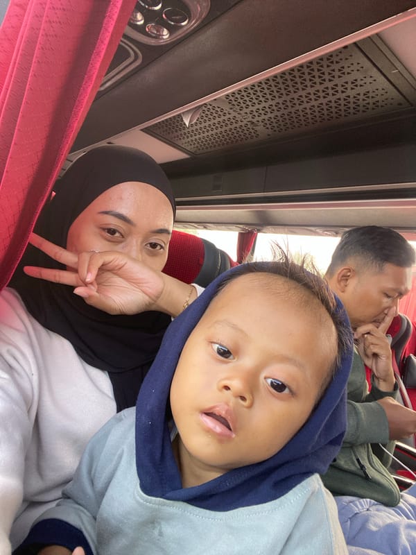 Bus ride through Melaya traffic, inside and out