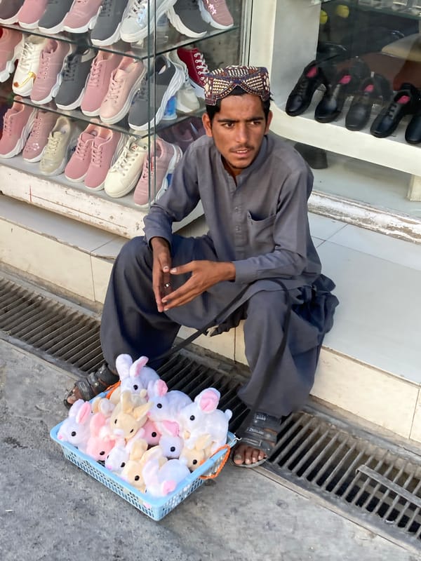 Street vendors display goods in Quetta marketplace Friday afternoon