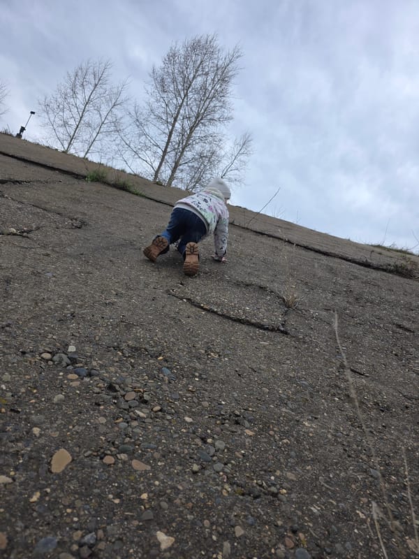 Mother and child visit riverside in Chaikovsky, Russia