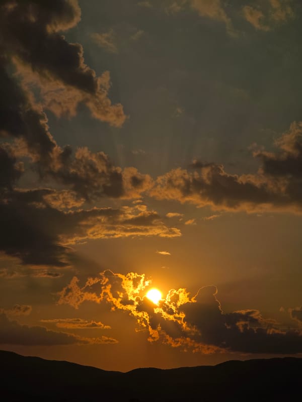 Sheep on the road and a stormy sunset in rural Bulgaria