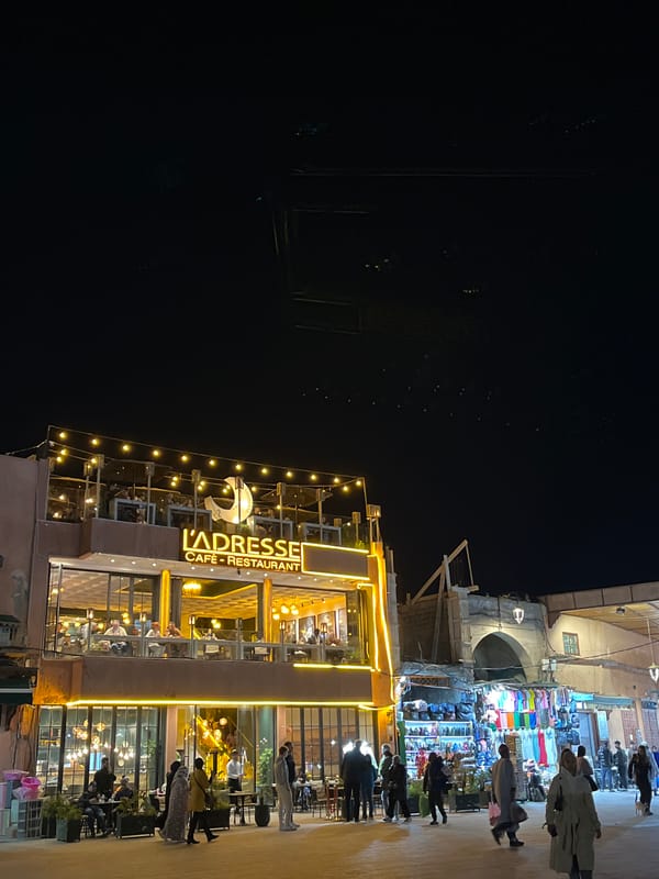 Evening crowds gather at Marrakesh's historic Jemaa el-Fnaa square