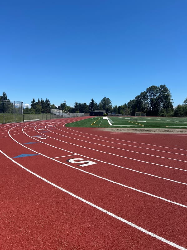 Athletic track facility observed in Everett under clear skies