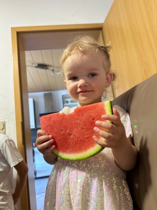 Family gathering with children, food, and play in Niederquembach