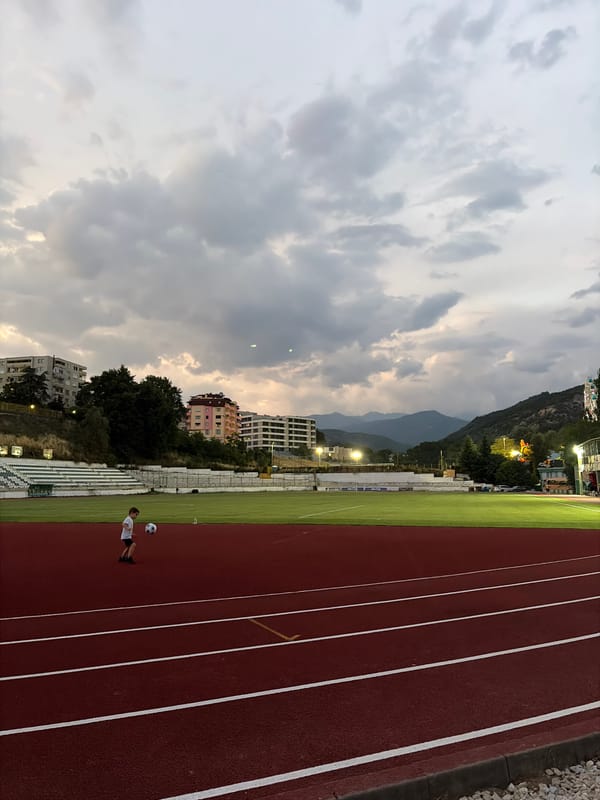 An evening in Sandanski: lakeside lights, tourist train, and park life