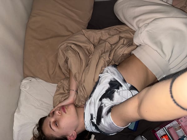 Woman resting in bedroom during afternoon in Sofia