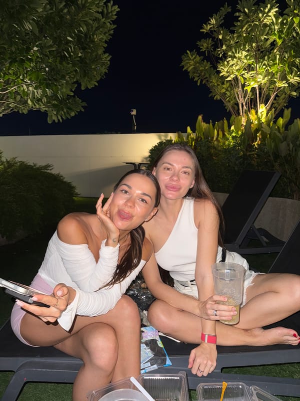 Two women relax on outdoor furniture in Choeng Thale