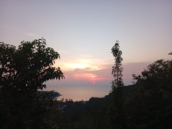 Sunset photographed over Andaman Sea from Thai coastal village