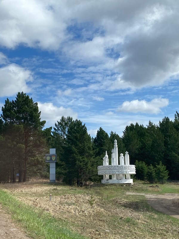 White Cyrillic monument observed in Jerdovka, Russia landscape