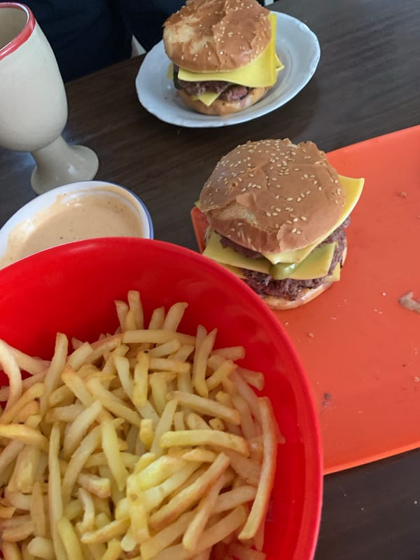 Casual meal with burgers, fries documented in Belgrade suburb