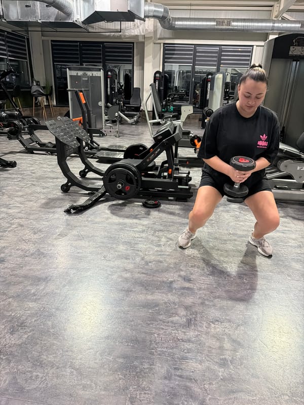Woman poses playfully on Pernik street, gym photos captured