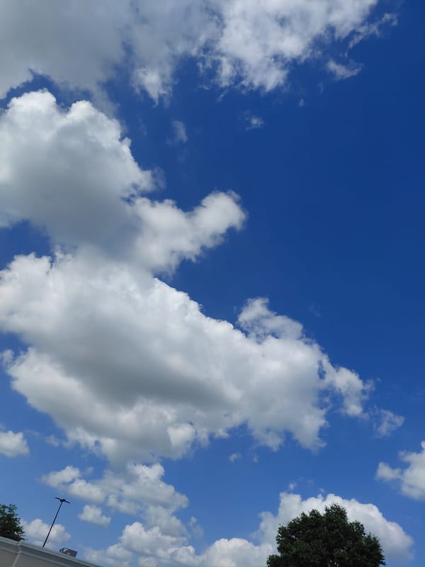 Blue sky and cumulus clouds over Nicholasville, Kentucky