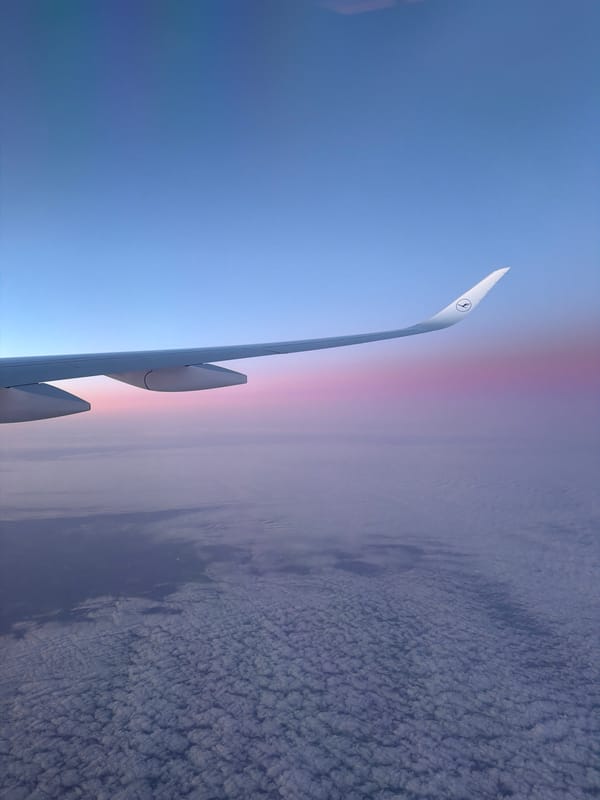 Lufthansa flight documented over Eitting Germany during sunrise hours