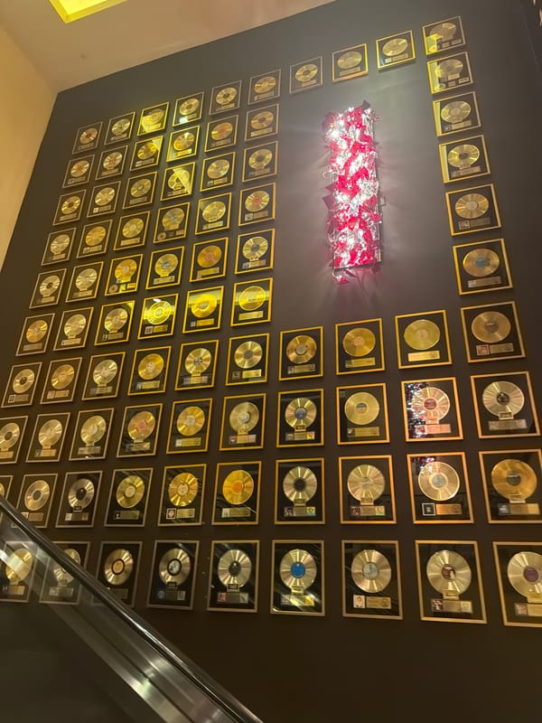Inside Seminole Hard Rock: casino floor, waterfall atrium, and gold records