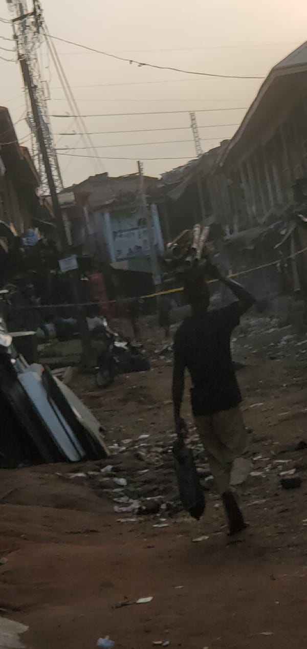 Debris-covered streets observed in Onitsha, Nigeria morning scene
