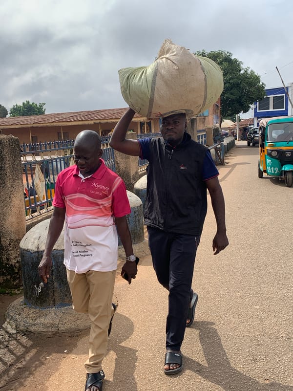Morning street life on foot in Jos, Nigeria