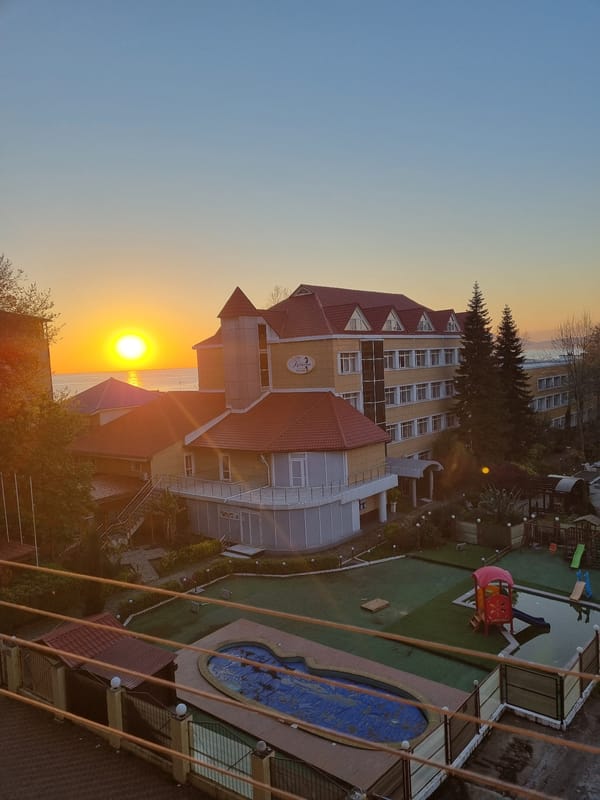 Aerial view captures Sochi coastal resort at sunset