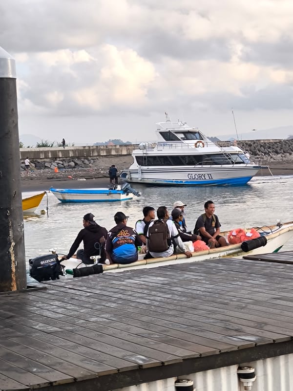Evening waterfront activity documented at Denpasar harbor