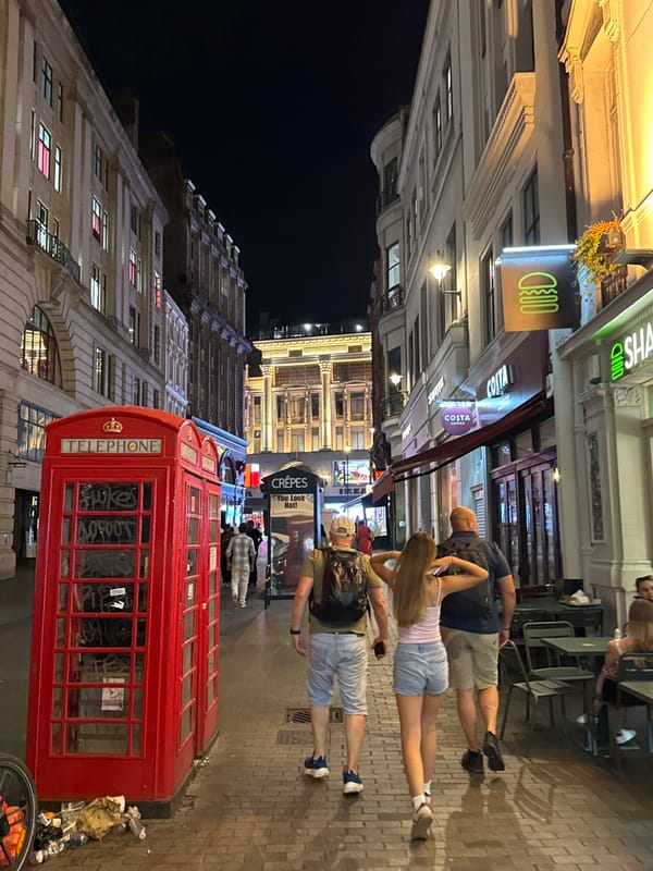 London night out: street-side phone box to busy restaurant