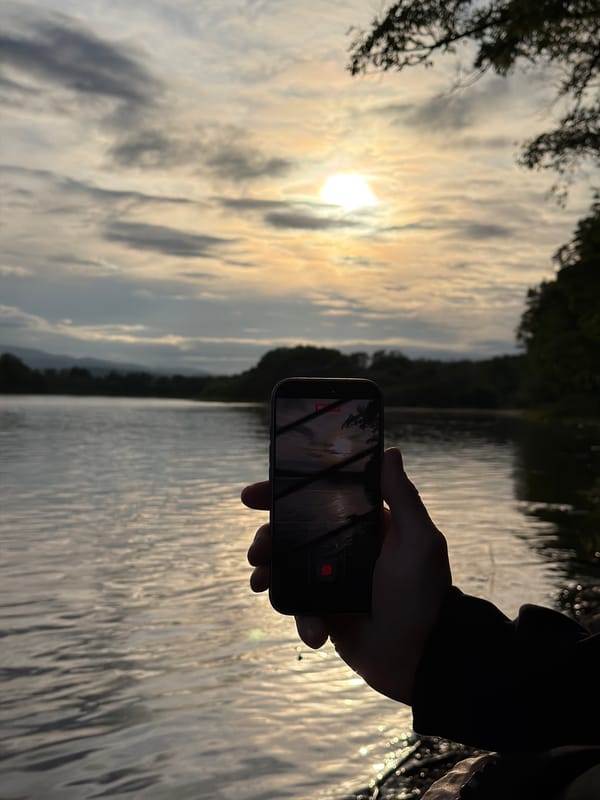Golden hour riverside gathering documented in Birobidzhan, Russia