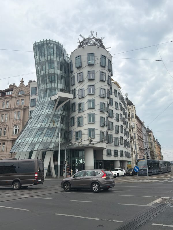Dancing House and a nearby archway entrance, Prague