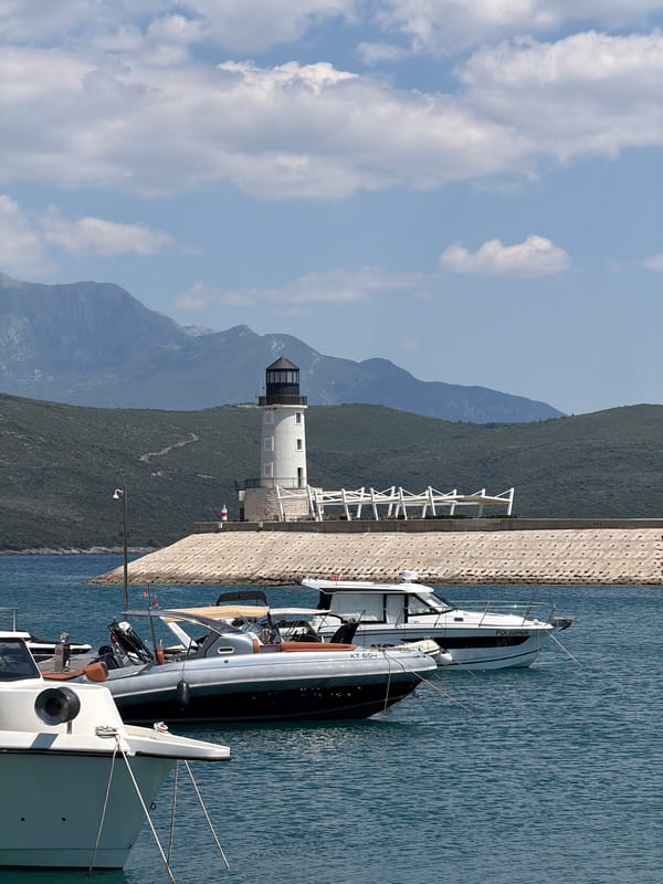 Radovići marina and waterfront on a clear Adriatic afternoon