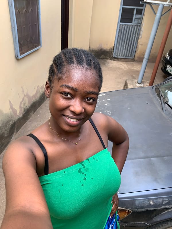 Woman takes selfies amid everyday life scenes in Nigeria