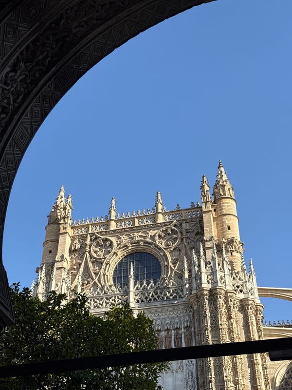 Exploring Seville Cathedral's Gothic details on a sunny afternoon