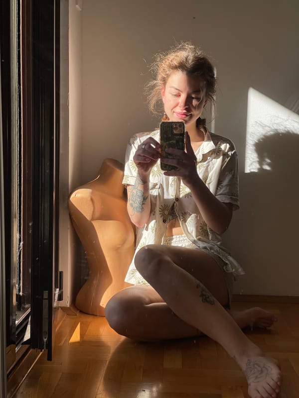 Woman takes morning selfies in Boreti, Montenegro home