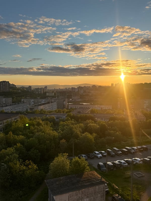 Murmansk city skyline bathed in late evening golden light