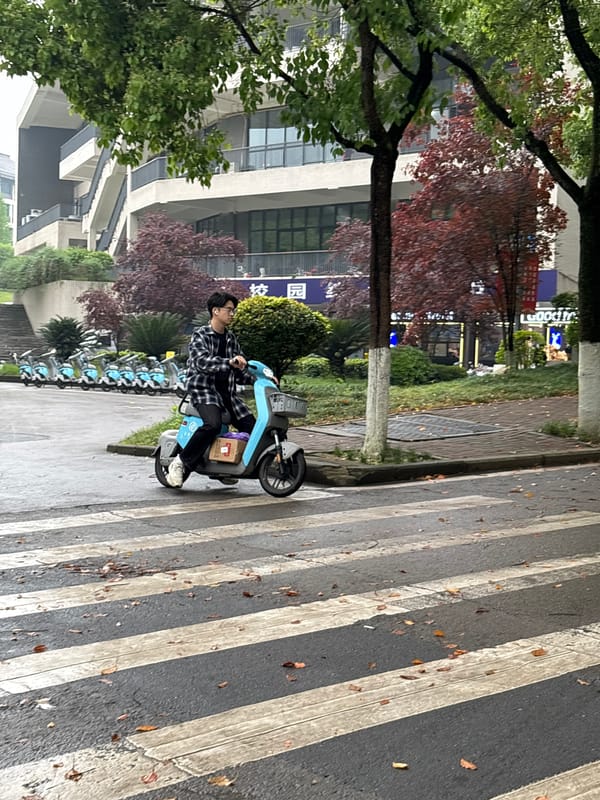 Morning scooter activity observed in Jiangjin crosswalk area