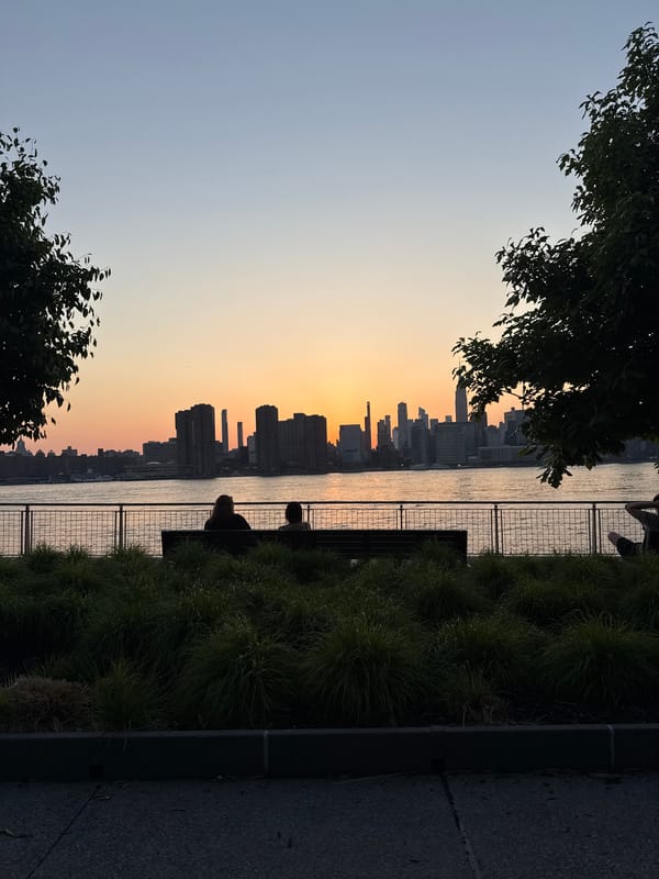 NYC skyline observed at sunset from Manhattan viewpoint