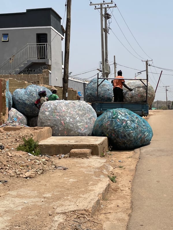 Daily life documented across Jos, Nigeria streets and commercial areas