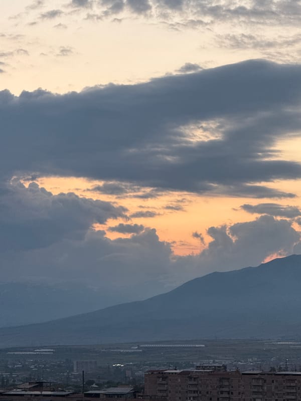 Dusk skies and mountain silhouettes over Abovyan, Armenia