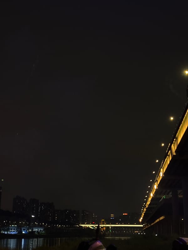 Nighttime riverside scenes documented across Chongqing districts