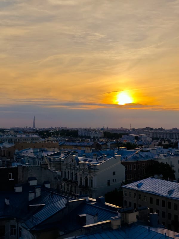 Saint Petersburg residents document sunset evening across city rooftops