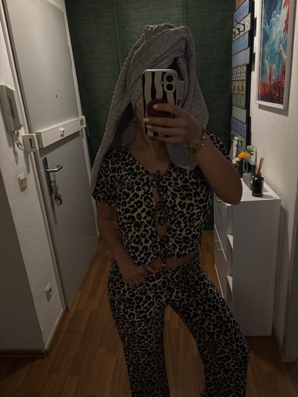 Berlin resident enjoys evening skincare routine, takes selfies