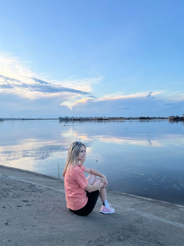 Evening leisure activities captured along Chaikovsky waterfront during sunset