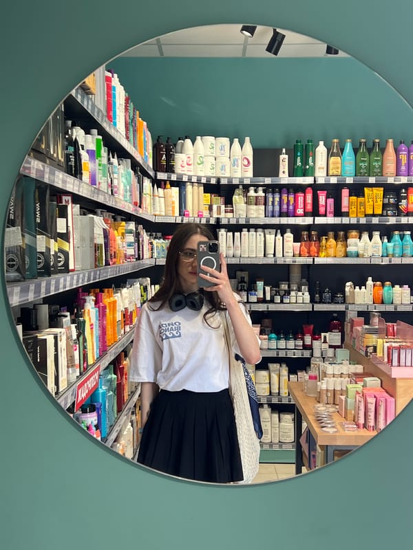 Young Women Take Mirror Selfies in Ternopil Beauty Store