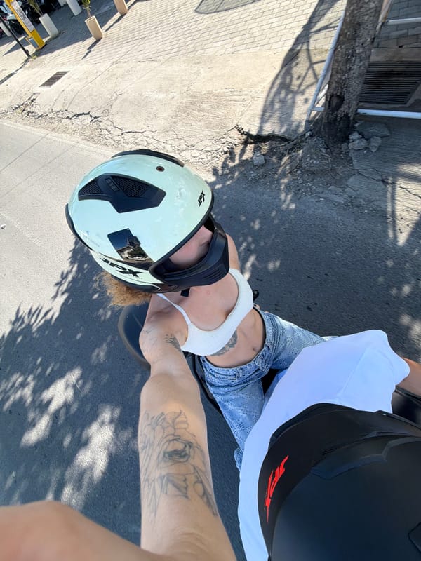 Motorcycle riders capture selfies during morning ride through North Kuta