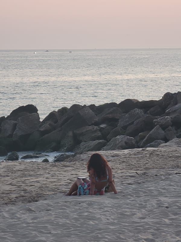 Sunset evening on Quarteira beach, Portugal