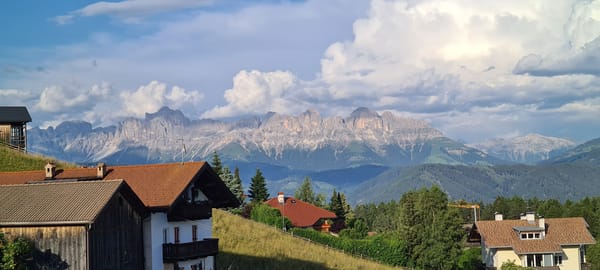Afternoon in a South Tyrolean village, Dolomites in the background