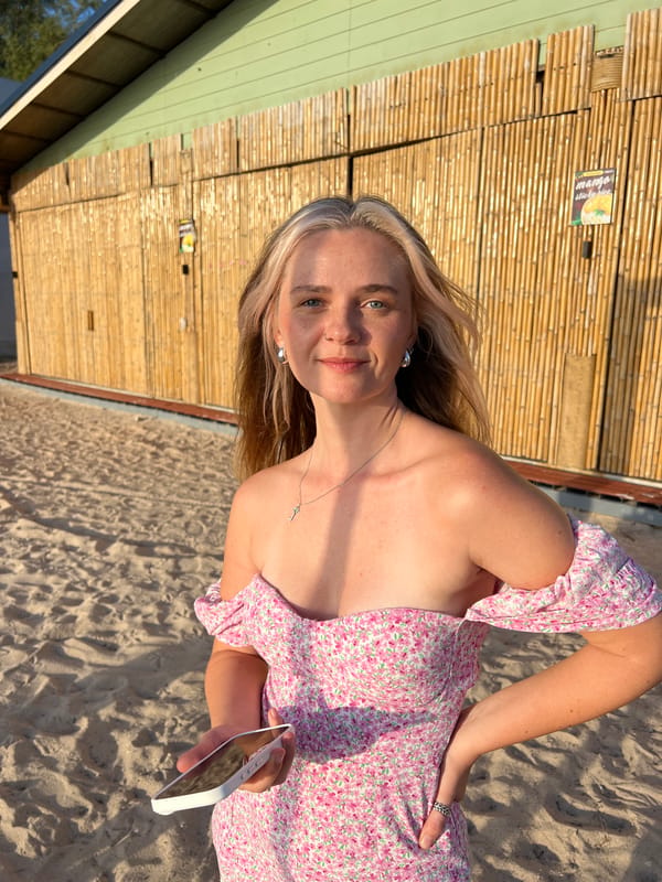 Beach swings, a blue-eyed cat, and a sunny morning shoreside
